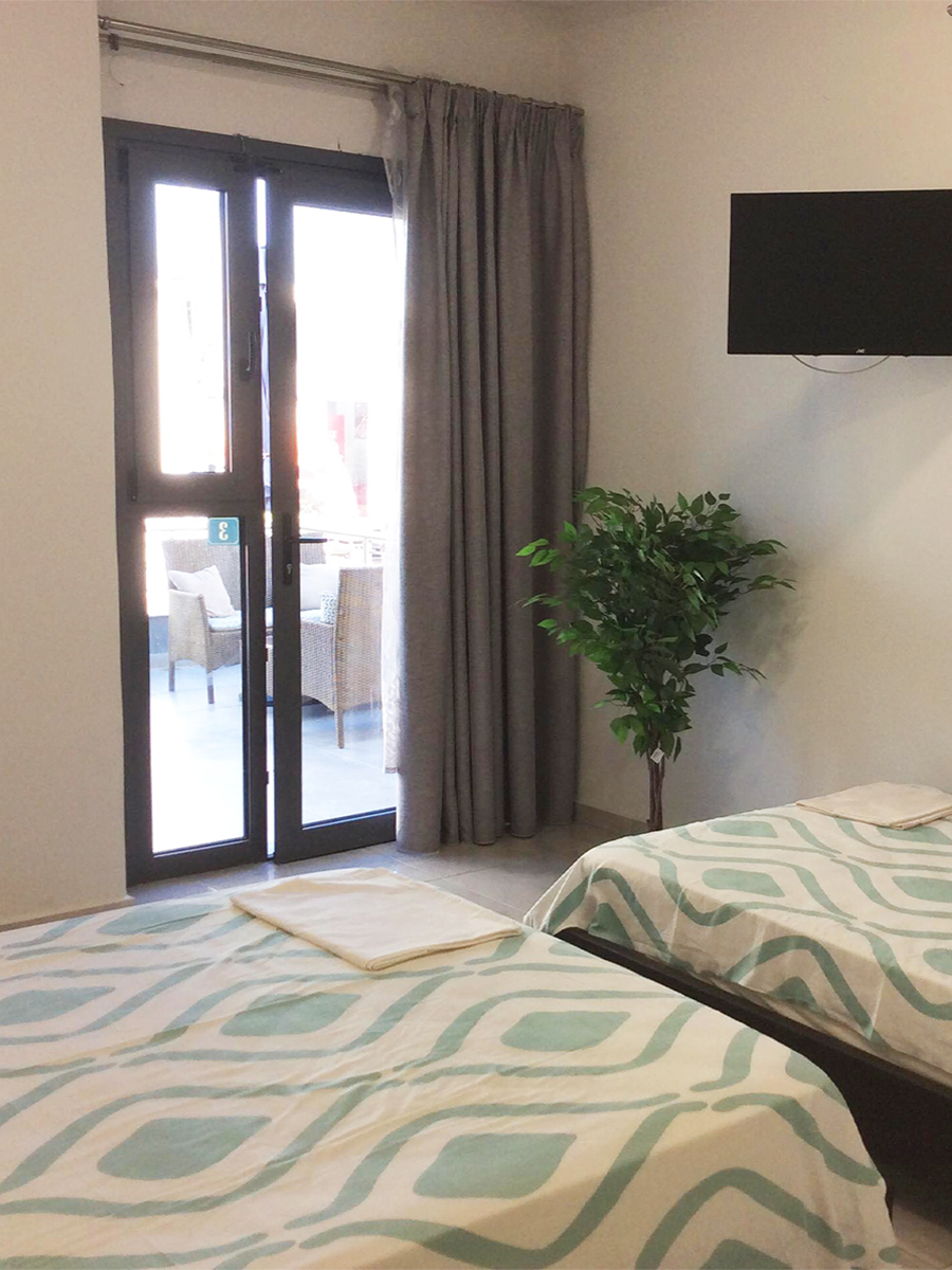 Room 1 - 1 Double & 1 Half Double Bed Room